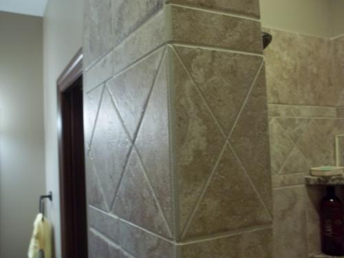 Custom tile with perfect cuts and matching grout